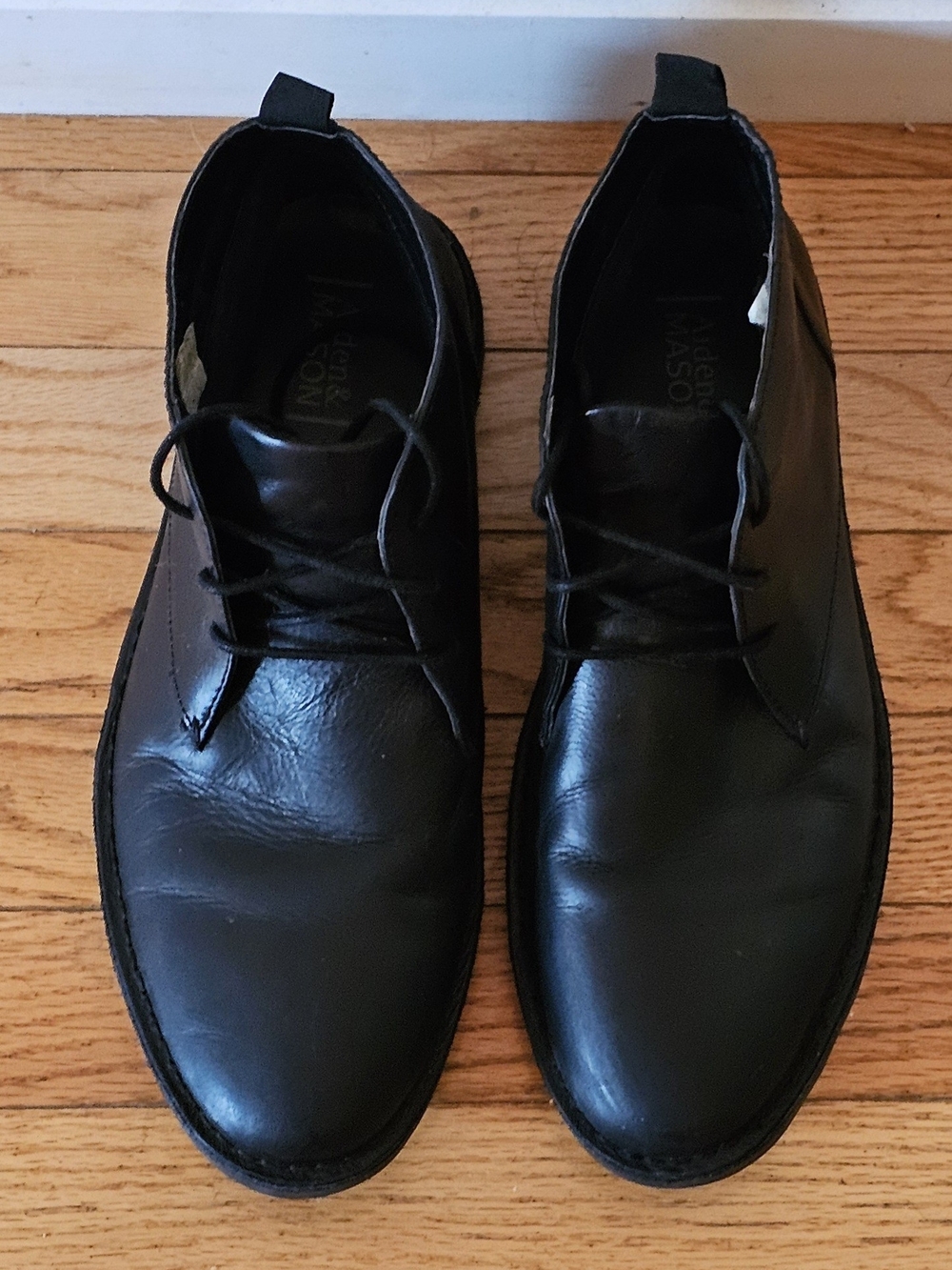 Men’s short dress boots.  Black leather.  Worn a couple of times Sz 9
